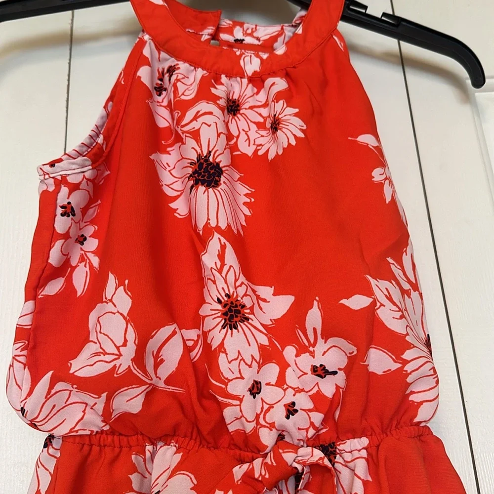 My Michelle girls floral romper orang & white one button bow in back. si…